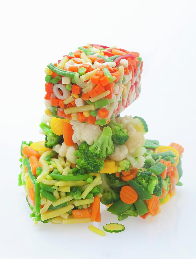 Blocks Of Frozen Vegetables Photograph by Studio Lipov