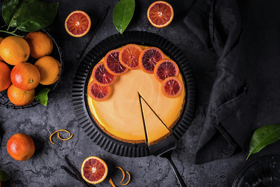 Blood Orange Cheesecake On A Dark Background Photograph by Christian Kutschka