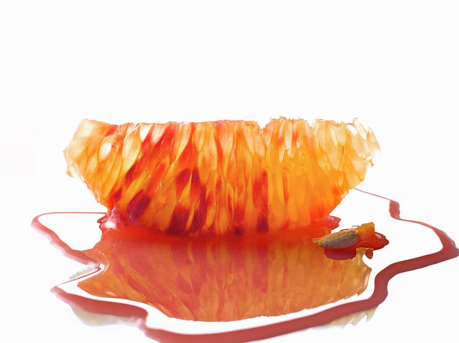 Blood Orange Segment With Juice Photograph by Studio