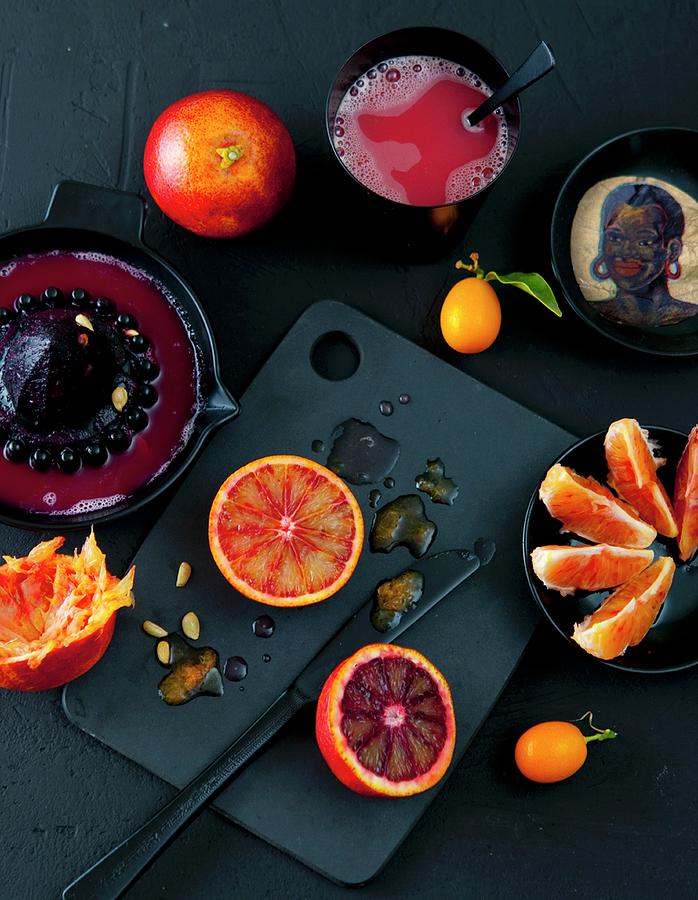 Blood Oranges And Kumquats With Juice Photograph by Udo Einenkel