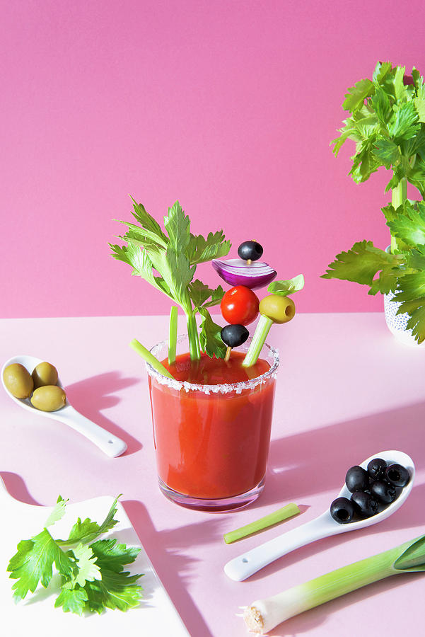 Bloody Mary Photograph - Bloody Mary, Tomato Juice And Vodka Coctail With Sea Salt Rimmed Glass by Magdalena Hendey