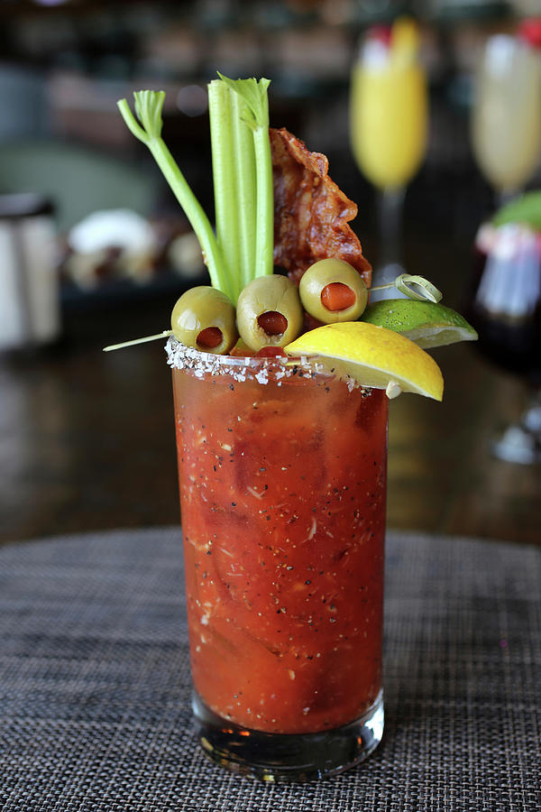 https://images.fineartamerica.com/images/artworkimages/mediumlarge/2/bloody-mary-with-olives-celery-and-bacon-doug-schneider-photography.jpg