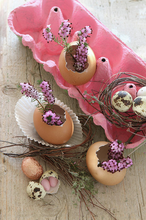 Blown Easter Eggs As Vases In A Pink Egg Box With Purple Heather And Sugar Eggs Photograph by Regina Hippel