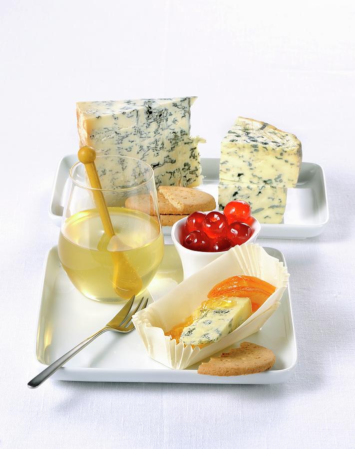 Blue Cheese With Various Jams, Savoury Biscuits And Candied Fruit Photograph by Franco Pizzochero