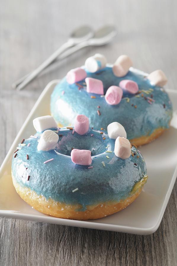Blue Doughnuts Topped With Marshmallows Photograph by Jean-christophe Riou
