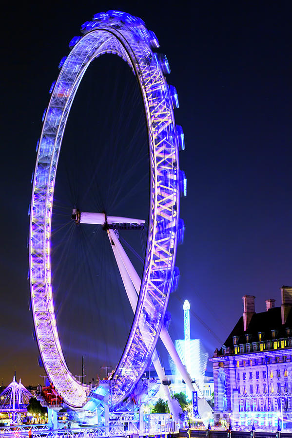 London Eye Photograph - Blue Eye in London at Night by John Rizzuto