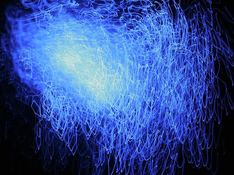 Blue Fiber Optic Light Streaks Against Photograph by Steven Puetzer