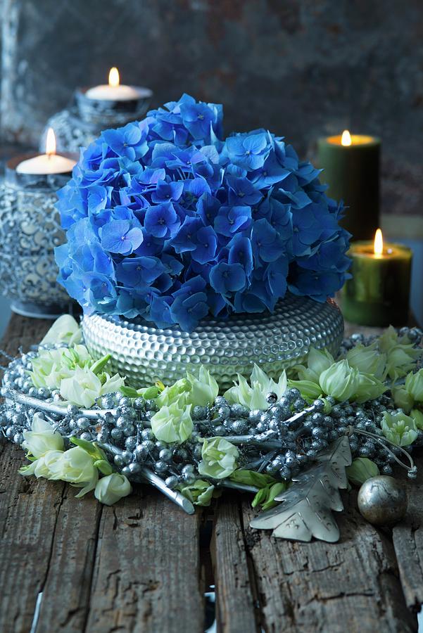 Blue Hydrangeas In Wreath Of Silver Berries And Yucca Leaves Photograph by Alena Hrbkov