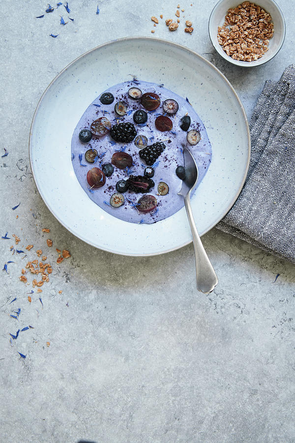 Blue Matcha Coconut Bowl With Fresh Berries And Oat Granola Photograph by Brigitte Sporrer / Stockfood Studios