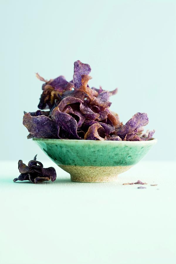 blue-potato-crisps-in-a-ceramic-bowl-photograph-by-michael-wissing-pixels