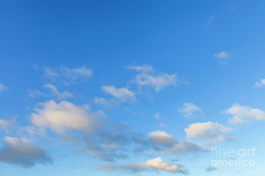 Blue skies with a few white fluffy clouds 591 Photograph by Simon Bratt