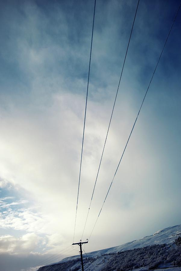 Blue Sky With Clouds And Electric Pole Photograph by Lluis Real - Fine ...