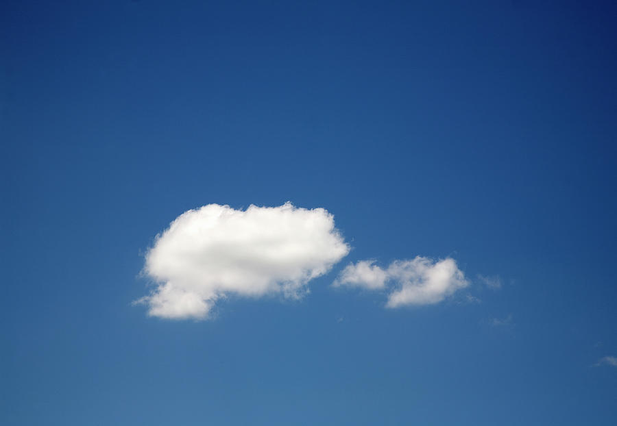 Blue Sky With Single Cumulus Cloud Photograph by Grant Faint