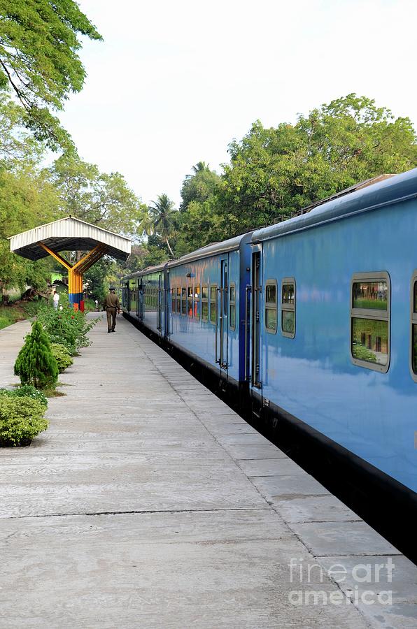 Blue Sri Lanka Colombo to Jaffna railway train parked at platform  Photograph by Imran Ahmed