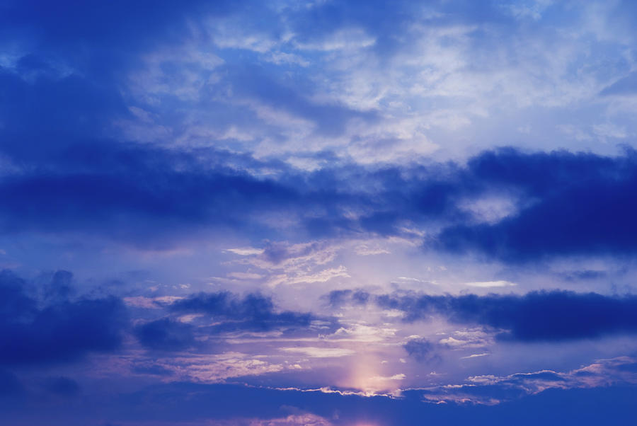 Blue Sunset Sky With Clouds Photograph by Digihelion