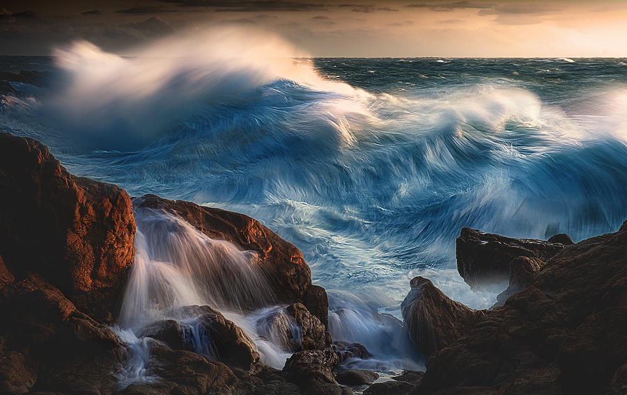 Blue Wave At Sunset Photograph by Paolo Lazzarotti