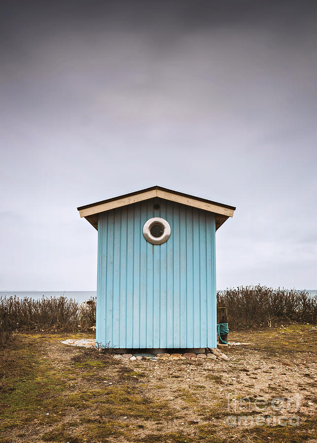 Blue wooden beach hut Photograph by Sophie McAulay