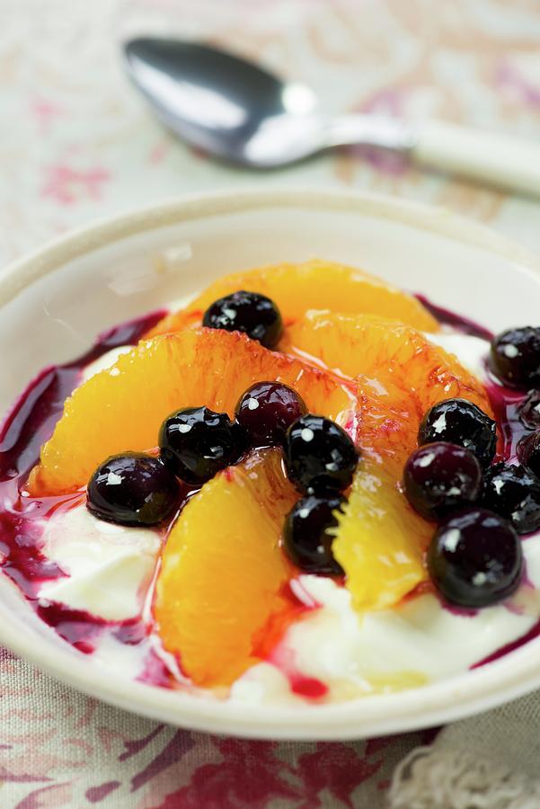 Blueberries And Oranges With Yoghurt Photograph by Jonathan Short