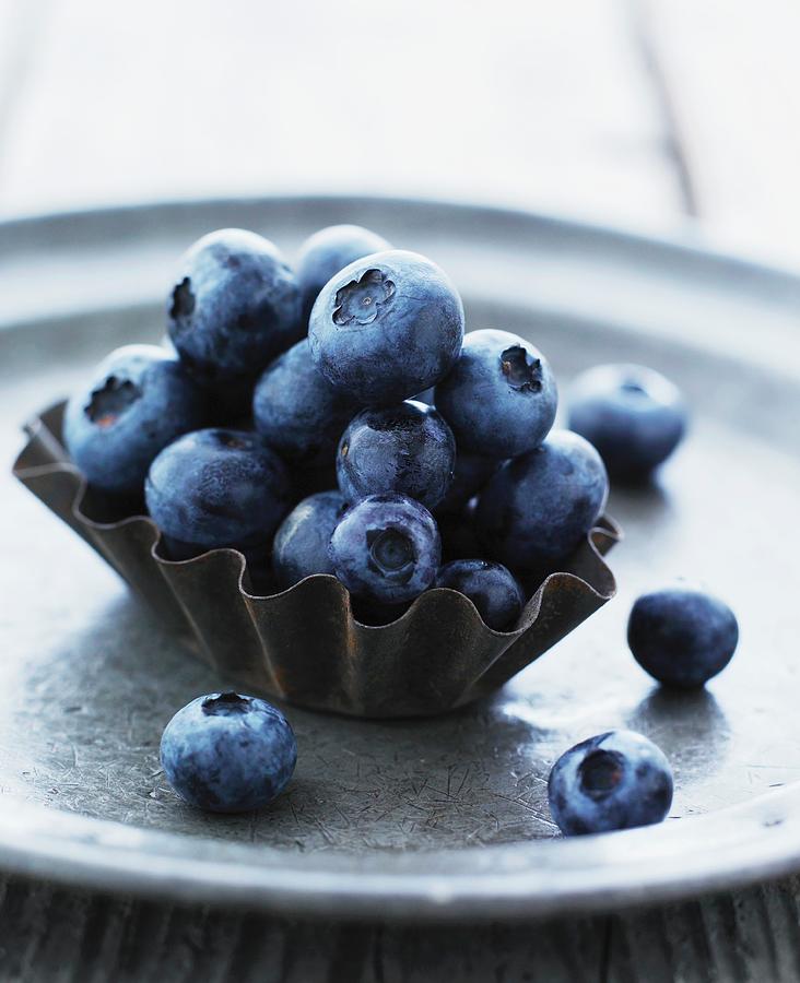 Blueberries In A Baking Tin Photograph by Mikkel Adsbl