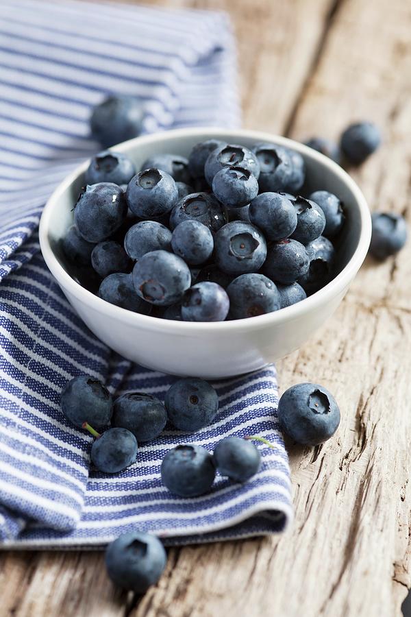 Blueberries In A White Bowl Photograph by Victoria Firmston