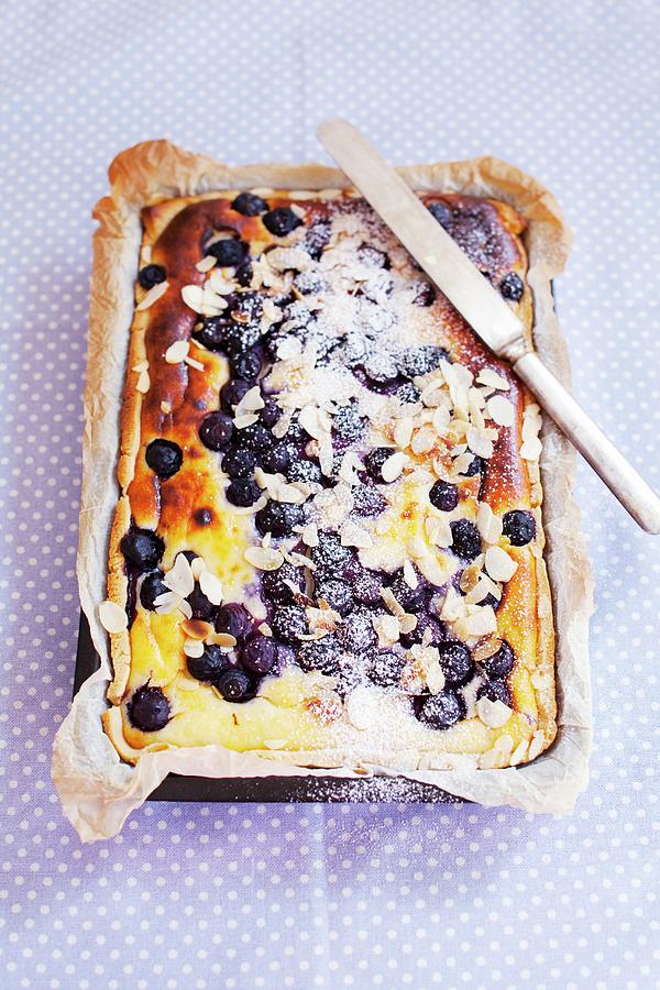Blueberry Cake With Slivered Almonds And Icing Sugar Photograph by Ekblom, Ulrika