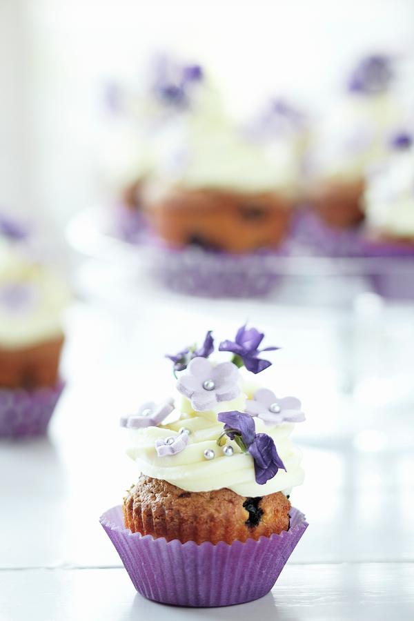 Blueberry Cupcake With Sugar Flowers And Violets Photograph by Atelier Mai 98