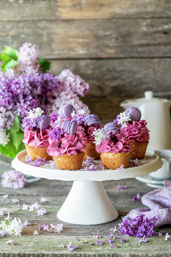 Blueberry Cupcakes Decorated With Mini Macarons Photograph by Irina Meliukh