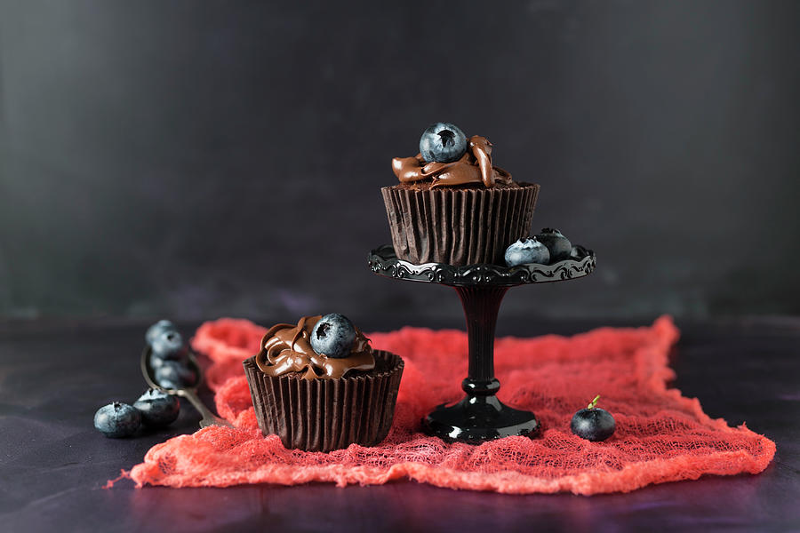 Blueberry Cupcakes With Chocolate Cream Photograph by Mandy Reschke
