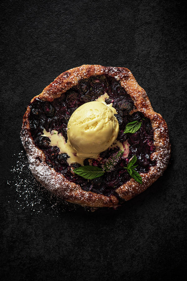 Blueberry Galette With Ice Cream On A Black Slate Photograph by Magdalena Hendey