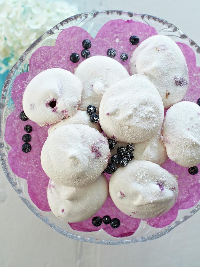 Blueberry Meringues With Icing Sugar Photograph by Hannah Kompanik