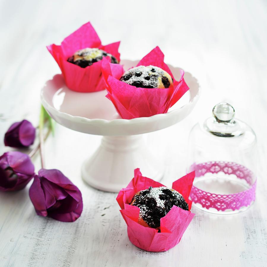 Blueberry Muffins On A Cake Stand And Next To A Glass Cloche Photograph by Mariola Streim