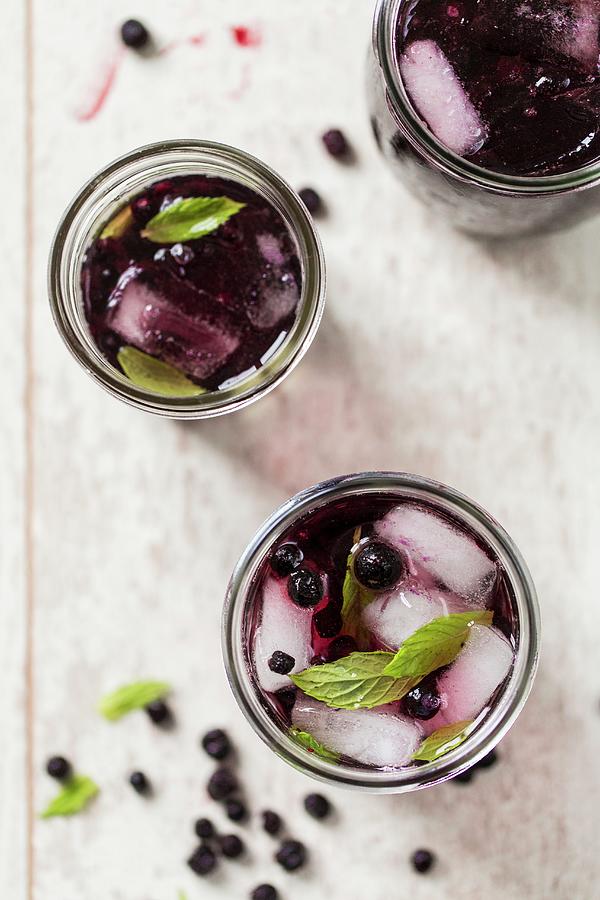 Blueberry Punch With Ice Cubes And Mint Photograph by Julia Cawley