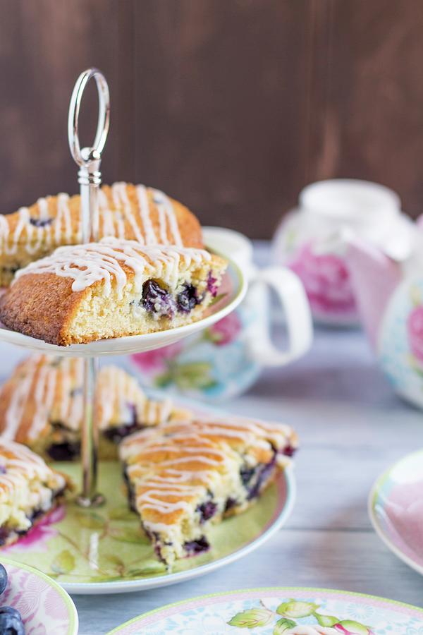 Blueberry Scones On A Cake Stand For Teatime Photograph by Kevin Buch