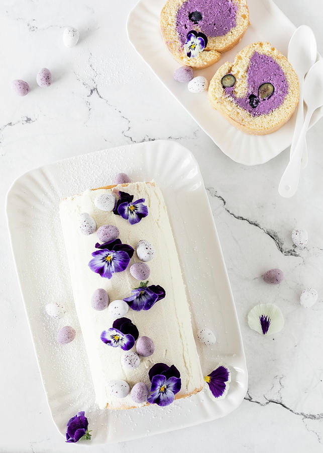 Blueberry Swiss Roll With Pansies Photograph by Emma Friedrichs