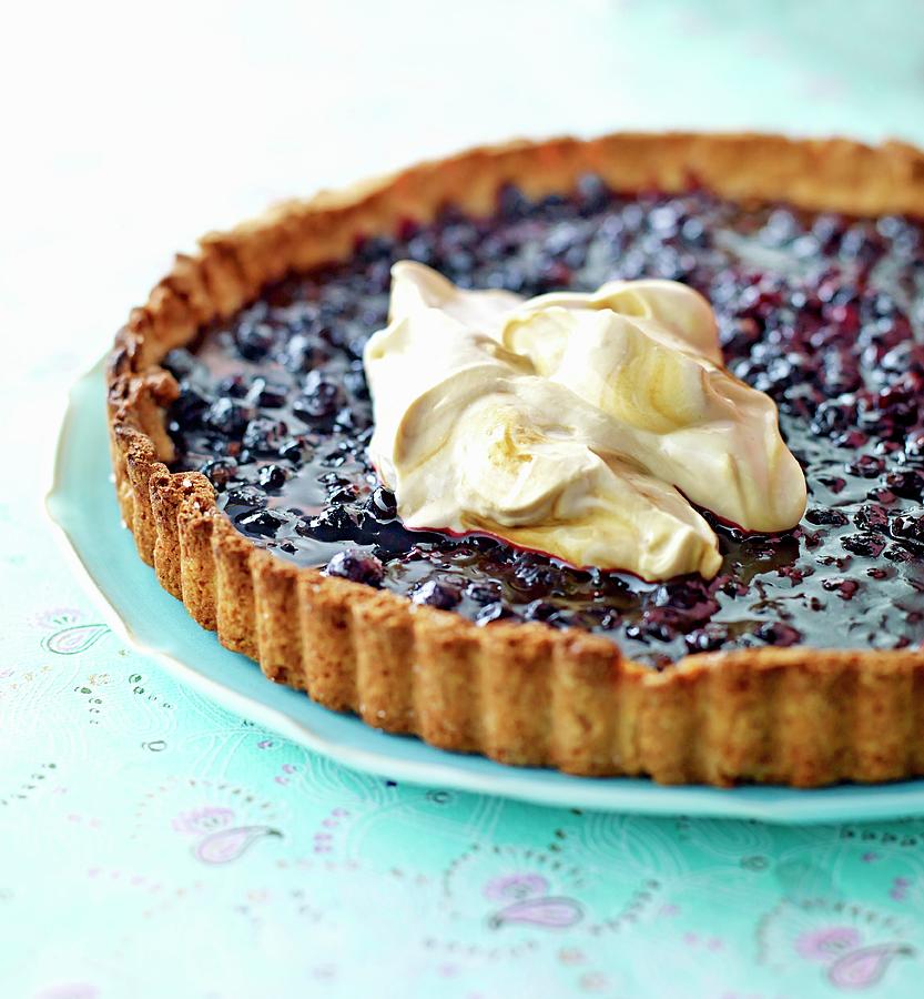 Blueberry Tart With Whipped Coffee Cream Photograph by Lars Ranek