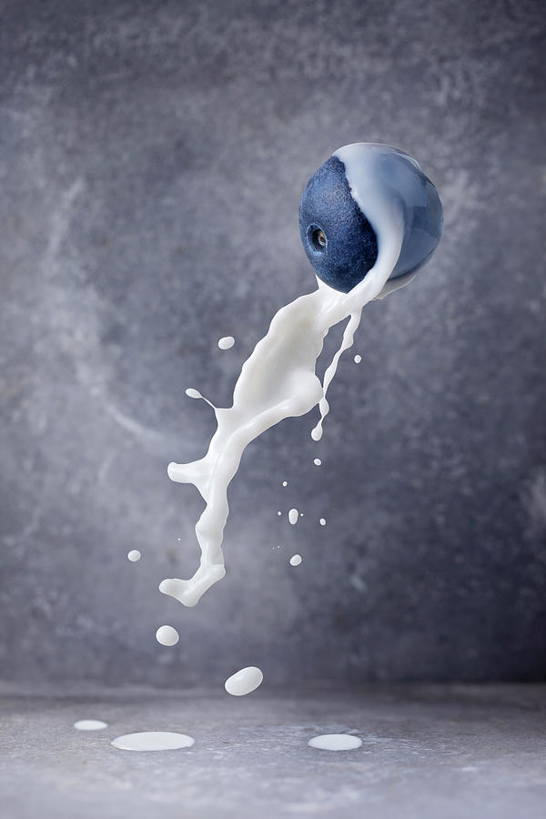 Blueberry With A Milk Splash Photograph by Petr Gross