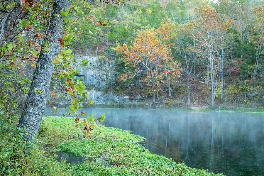 Bluff line reflections in the Fall at Alley Spring Mo. Photograph by Jack Clutter