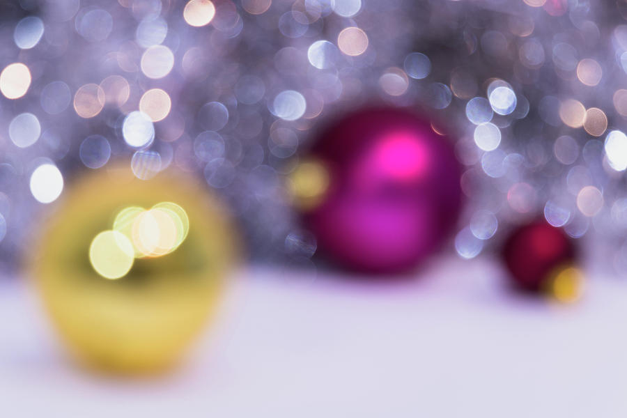 Blurry Christmas background with Christmas balls and bokeh Photograph by Cristina Stefan