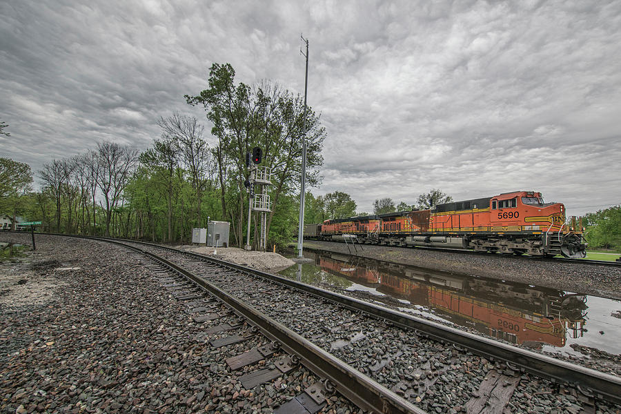 BNSF 5690 leads a westbound coal train Photograph by Jim Pearson