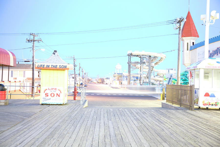 Boardwalk And Amusement Rides In Photograph by Michael Duva
