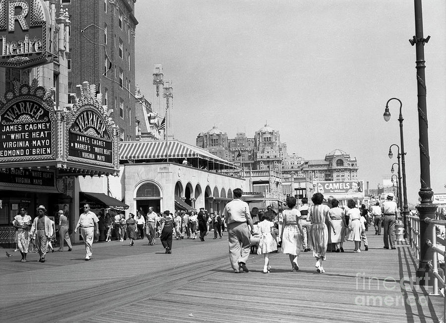 Boardwalk Scene Warner Theatre On Left Photograph by Bettmann