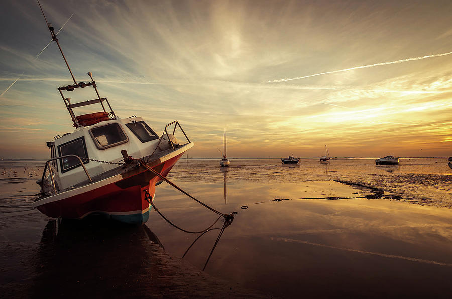 Boat In Low Tide Sunset Photograph by Scott Baldock
