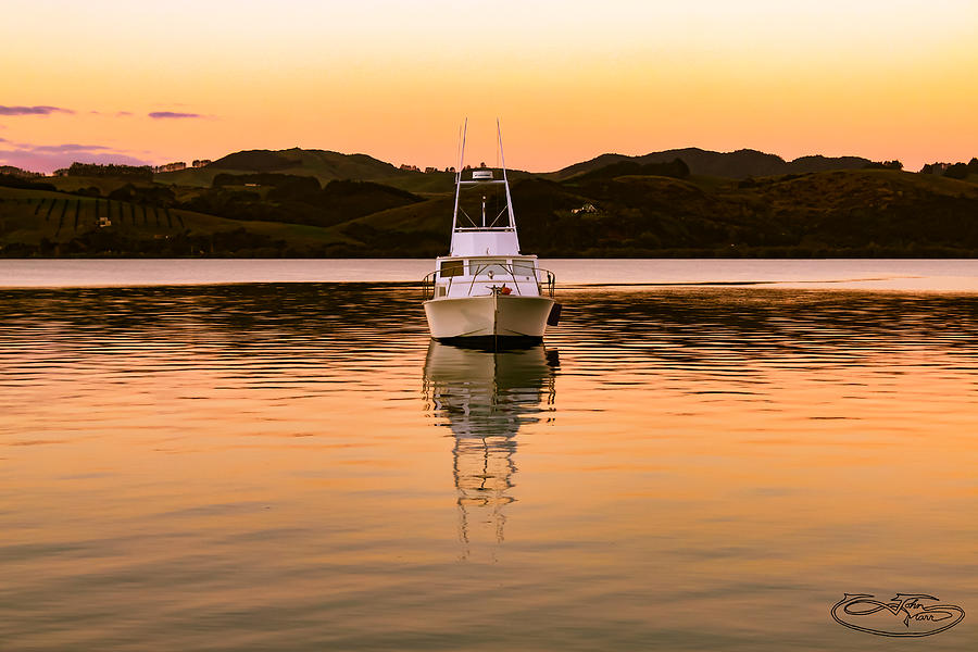 boat in north island NZ bay Photograph by John Marr