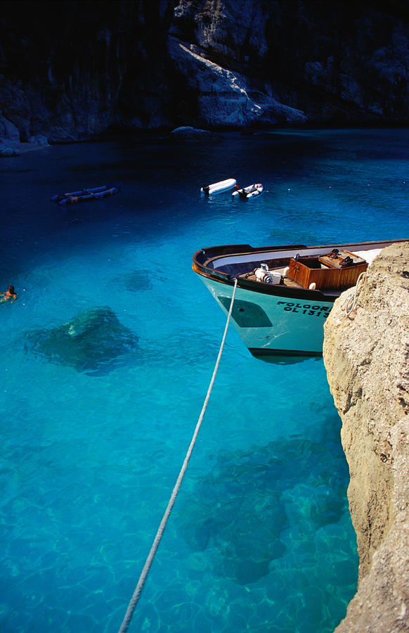 Boat In Water Of Cala De Mariolu, Golfo Photograph by Damien Simonis Boat In Water Of Cala De Mariolu, Golfo Photograph by Damien Simonis