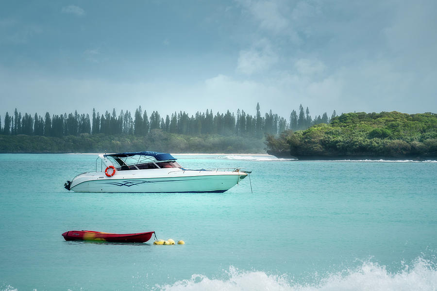Boat on the water at Kuto Bay in New Caledonia by Daniela Constantinescu Boat on the water at Kuto Bay in New Caledonia by Daniela Constantinescu