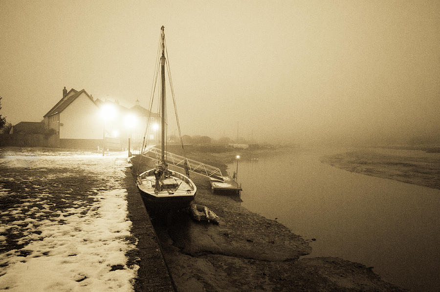 Boat Photograph - Boat on wintry quay by Gary Eason