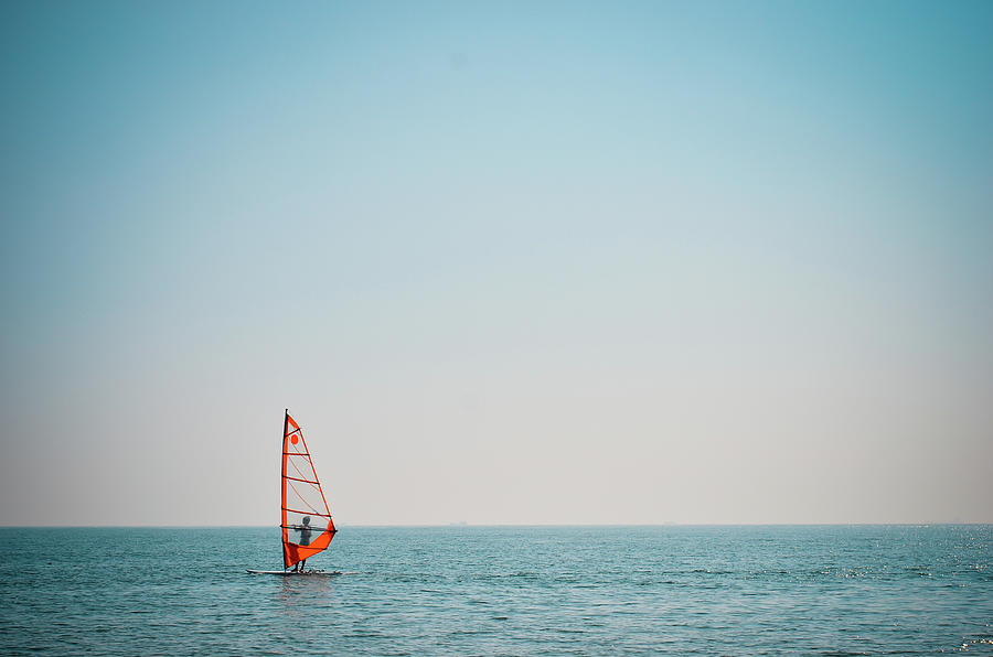 Boat Sailing In Blue Water Photograph by Copyright By Ata Mohammad Adnan