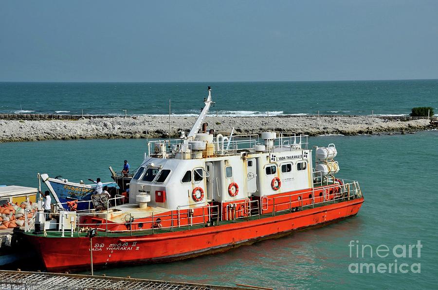 Boat with crew readying for departure at harbor on Palk Strait Jaffna Peninsula Sri Lanka Photograph by Imran Ahmed