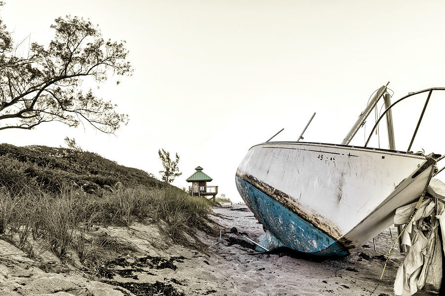 Boat Wreck On Beach With Lifeguard Tower In Background Digital Art by Laura Diez