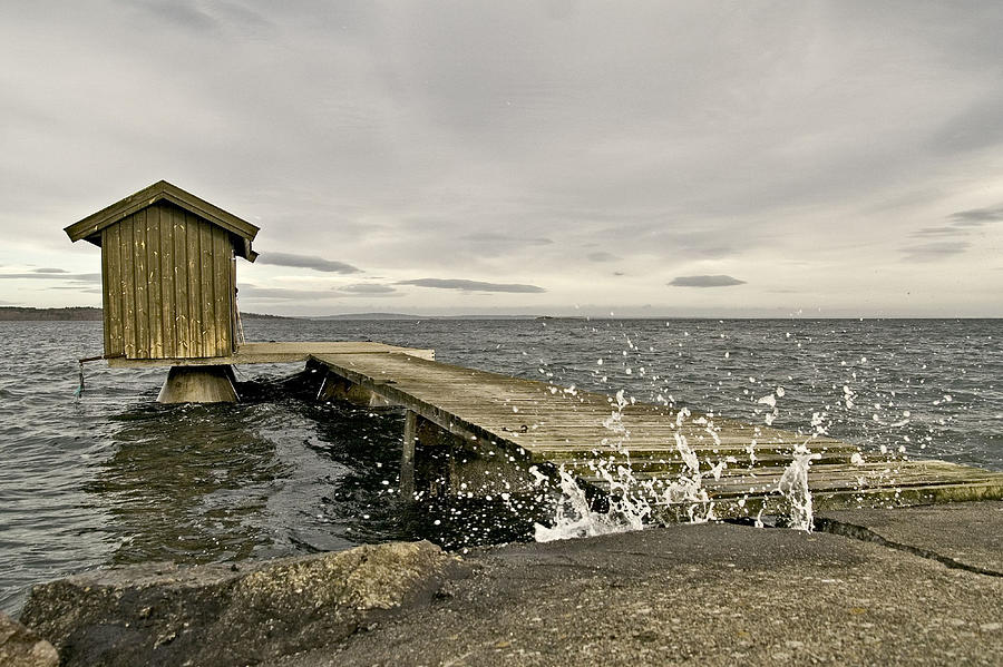 Boathouse By Fjord With Breaking Wave Photograph by Audun Bakke Andersen